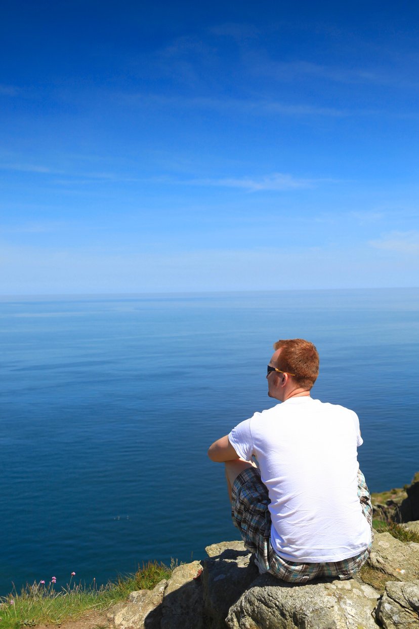 Man looking toward ocean